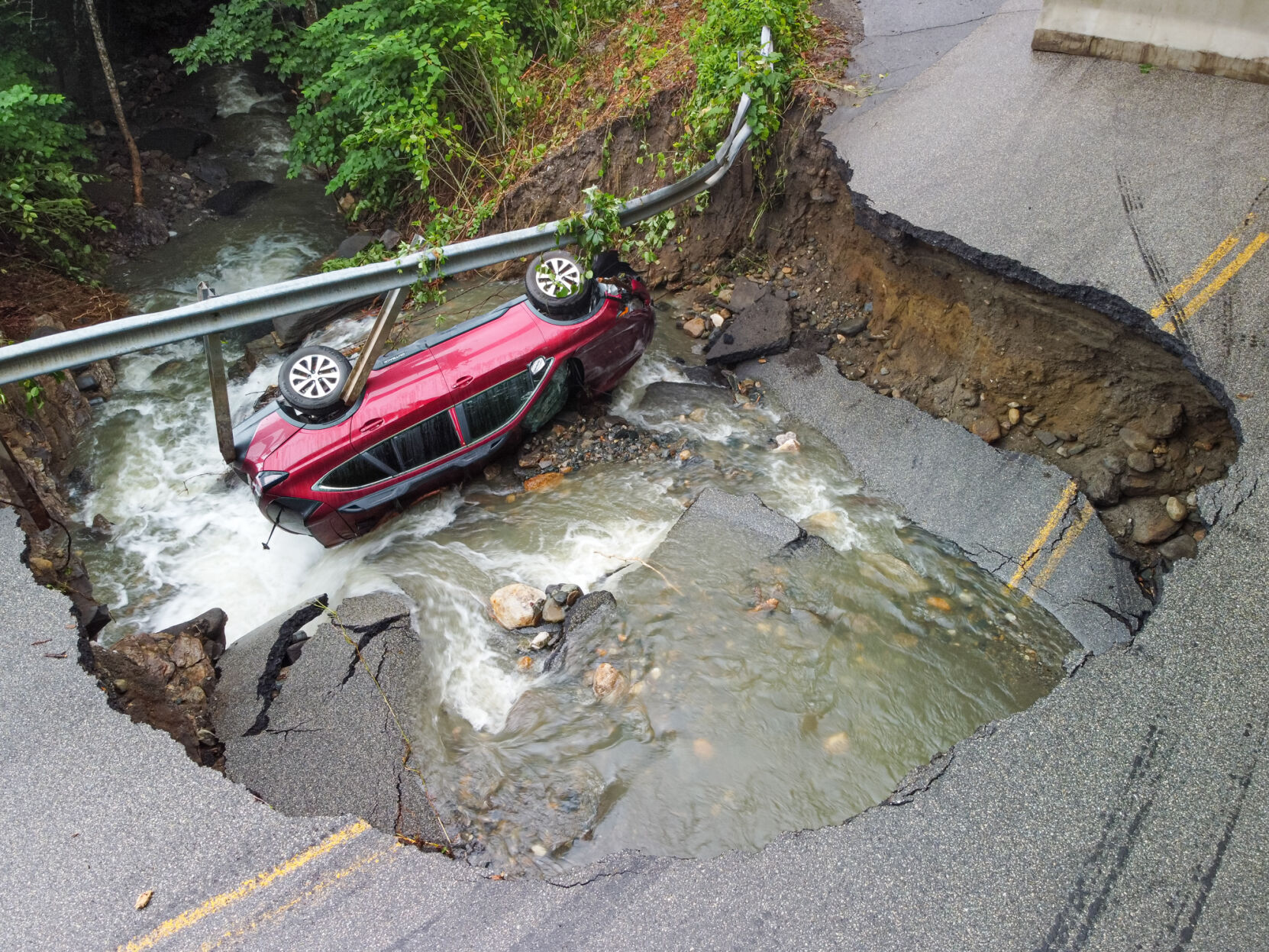 Heavy rains wash out bridge on Hinesburg Rd.
